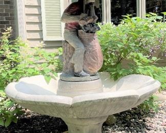 FOR IMMEDIATE SALE $400.00 This unique cement fountain is in working order.  The figure is of a golfer getting out of the rain.  Please call 612-462-2293.