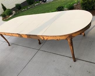 Romweber 10'6" oval dining room table with protective pads.  All the way extended.  Seat 8 very comfortably.