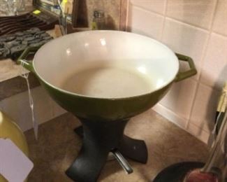 Copco enameled cast iron pot with cast iron warmer