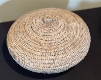 Hand Made Coil Weave Basket	6 inches high by 10 inches diameter	
