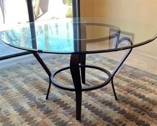 Glass Top Iron Frame Dining table w- 4 upholstered Chairs	Table: 3in H x 56in Diameter	

