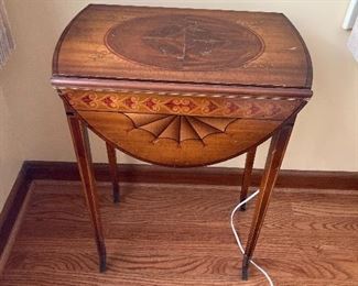 Drop side inlay table