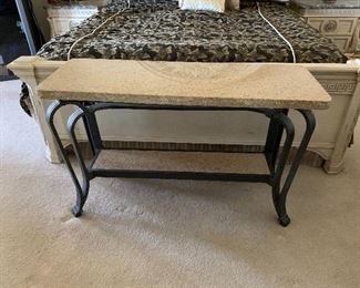 Solid granite top and shelf. 