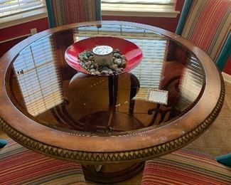 $675- 54” metal , wood and smoke  glass table with four exquisitely designed custom chairs 