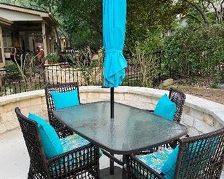 $575- OBO-Patio set including tabke ? Four chairs , umbrella and stand 