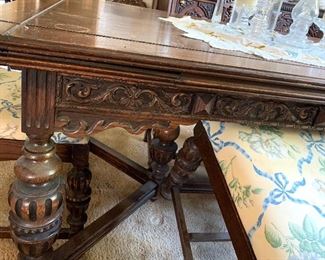 Vtg. ornately carved buffet, table and 6 chairs