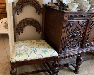 Vtg. ornately carved buffet, table and 6 chairs