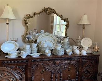 Vtg. ornately carved buffet, table and 6 chairs