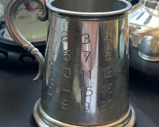 Pewter childs cup - alphabet on one side and numbers on the other
