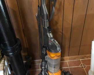 Dyson vacuum cleaner (on/off button is broken and therefore taped to the on position - machine must be unplugged to turn off)