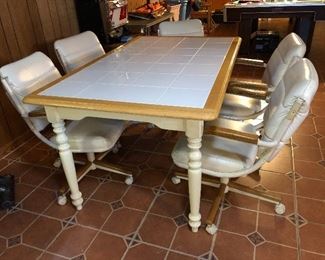 White tile topped table and chairs (sold separately)