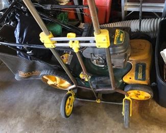 Lawn mower and another hand truck
