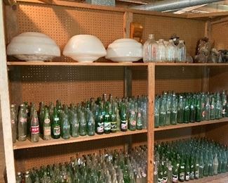 Soda bottle collection and vintage light fixtures