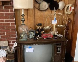 Vintage hats, lamp and console tv