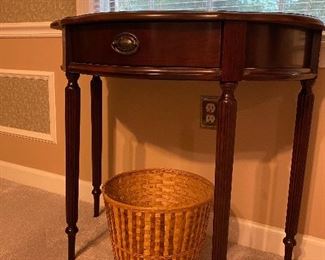 Small demilune table with drawer