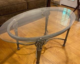 Oval glass top coffee table 