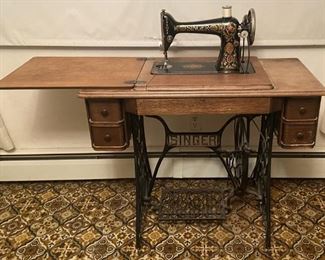 Antique Treadle-Operated Singer Sewing Machine With Sewing Contents
