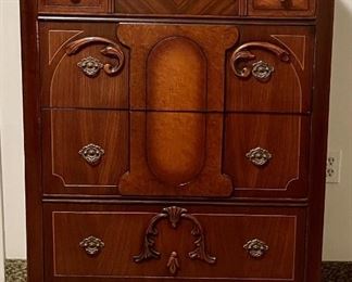 Antique Gentleman's Chest On Casters With Brass Pulls And Carved Wood Front