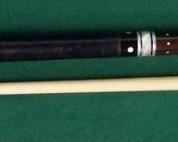 1011 Palmer Pool Cue; Pre-First Catalog, Model H Circa 1964; butt: 28 1/2", 14 oz; shaft: 28", 3.6 oz, 12.5mm; total length 56 1/2", 17.6 oz; possible older refinish; original leather wrap very likely installed by George Balabushka for Palmer; 20 MOP inlays; window reads "Mike Izzo" "Original by Palmer" on silver foil; non-catalog butt sleeve ring configuration; slight lift at butt joint; shaft with minor taper roll but tip doesn't leave the table; good condition