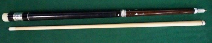 1011	Palmer Pool Cue; Pre-First Catalog, Model H	Circa 1964; butt: 28 1/2", 14 oz; shaft: 28", 3.6 oz, 12.5mm; total length 56 1/2", 17.6 oz; possible older refinish; original leather wrap very likely installed by George Balabushka for Palmer; 20 MOP inlays; window reads "Mike Izzo" "Original by Palmer" on silver foil; non-catalog butt sleeve ring configuration; slight lift at butt joint; shaft with minor taper roll but tip doesn't leave the table; good condition
