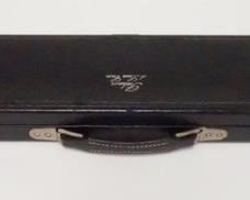 1037 Palmer 1x2 deLuxe Case Black exterior, black interior, silver stamped logo, no key; 31 1/2" long; holds 1 butt and 2 shafts; very good condition