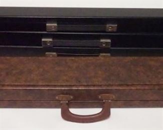 1047 Four (4) Box Cue Cases (1) Vintage 1x2 box case with brown exterior and black interior; missing one interior divider, 31 1/2" long, fair condition; (2) Vintage 1x2 box case with black exterior and red interior, 31 1/2" long, fair condition; (3&4) identical pair of 1x1 box cases with black exterior and red interior, each is 32" long, excellent condition