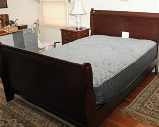 SLEIGH BED WITH AN NEAR NEW ADJUSTABLE MATTRESS WITH REMOTE CONTROL