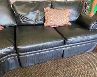 1/ $395 Henrendon black vinyl wrap around sofa 9'4" x 39"deepx 3' T