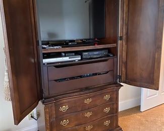 11/ $395 Henredon armoire 40 1/2"L x 20"D x 79"H Can accomodate a 40"TV 
