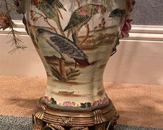 20- $150 Pair of porcelain bird vases with arrangements 