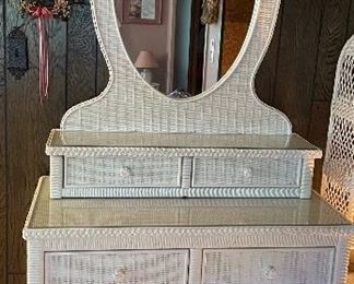 Beautiful wicker dresser and mirror with protective glass tops