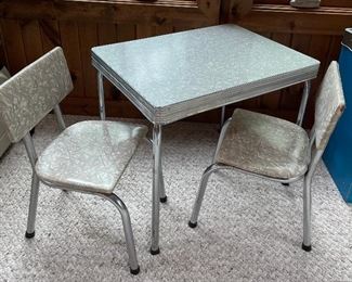 CHILDS FORMICA TABLE AND TWO CHAIRS