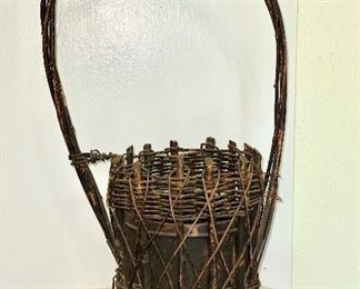 Old woven twig flower holder with metal insert. $20 