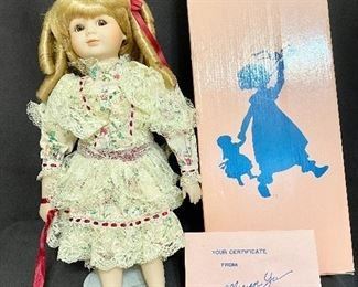 1989 Marian Yu Design Co Porcelain Victorian Doll. Has original box and certificates. Barefoot with stand. Measures 16" tall. No chips or cracks, marked No 619/10,000. $20