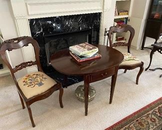 Pair of Victorian style mahogany side chairs with needlework seats