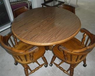 Dining table with 4 chairs and leaf