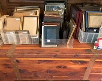 Cedar chest; some of the many frames