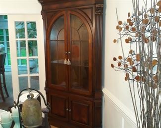 Quality corner cabinet. Lighted. Adjustable glass shelves with plate grooves