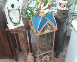 Bird houses, bird cage and plant stands