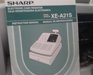 Sharp cash register with manual