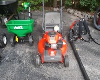 Lawnmower, blower pack, spreader