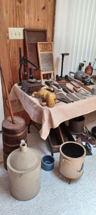 antique washboards, cleavers, jugs and butter churn