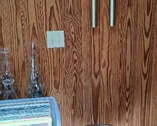 brass pot on stand, wall clock