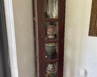 Wood and glass display cabinet: 75” tall x 16” wide x 14” deep - $125.0