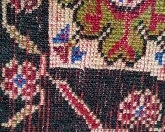 The back of the wool rug