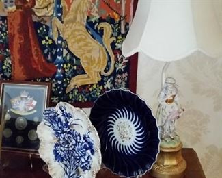 The second of a pair of lamps and two  plates