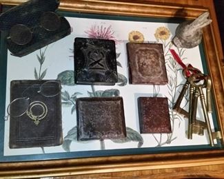 Vintage glasses and antique ambrotype photos in cases