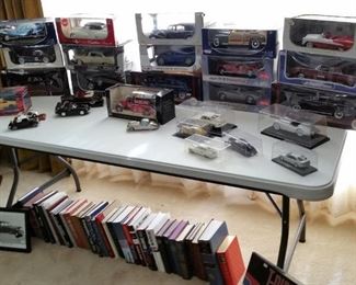 Lots of die cast cars.  Most are 1:18 scale.
