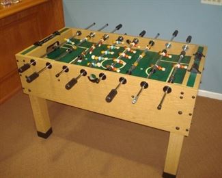 Lower Level Bar Area: This is the larger of two available foosball tables. (This one is missing one grip.)