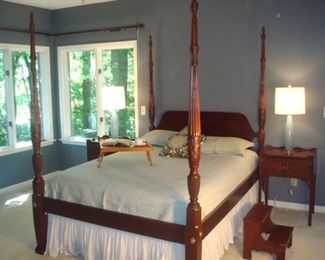 Master Bedroom: Breakfast in bed? Picture yourself sipping your morning coffee with a good read in this COUNCILL CRAFTSMAN four-poster queen-size bed, includes headboard, footboard and side rails.  The COUNCILL CRAFTSMAN side tables and lamps are separately priced, as is the mattress (see upcoming photos).